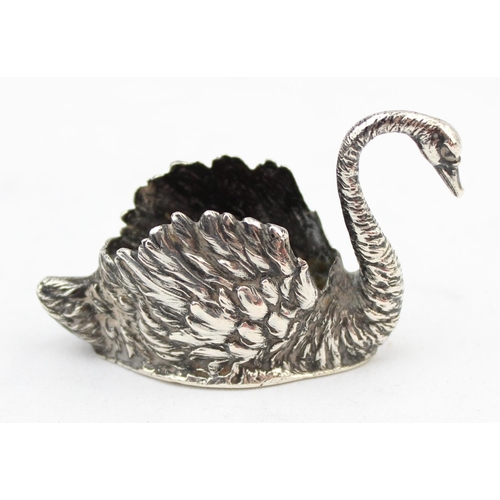 1055 - An antique silver swan pin cushion, lacking interior, marked to base indistinctly but XRF confirmed ... 