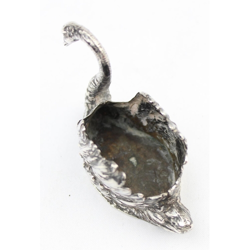 1055 - An antique silver swan pin cushion, lacking interior, marked to base indistinctly but XRF confirmed ... 