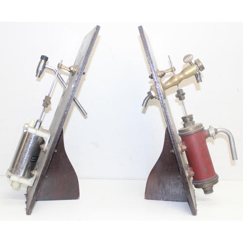 143A - Pair of vintage beer pumps mounted on wooden backs