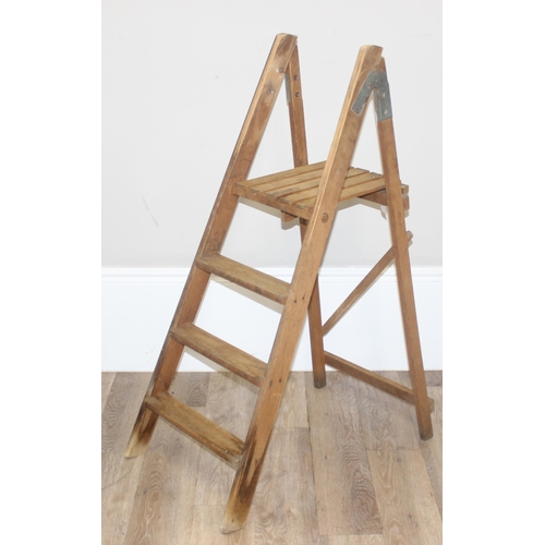 177 - 2 vintage wooden stepladders