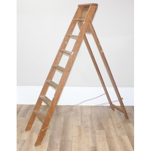 177 - 2 vintage wooden stepladders