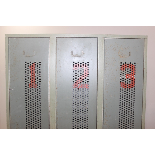 179 - An industrial metal 3 section locker, grey painted and numbered, approx 90cm wide x 50cm deep x 185c... 