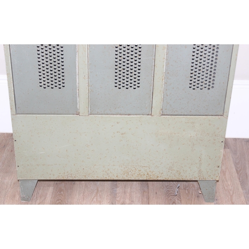 179 - An industrial metal 3 section locker, grey painted and numbered, approx 90cm wide x 50cm deep x 185c... 