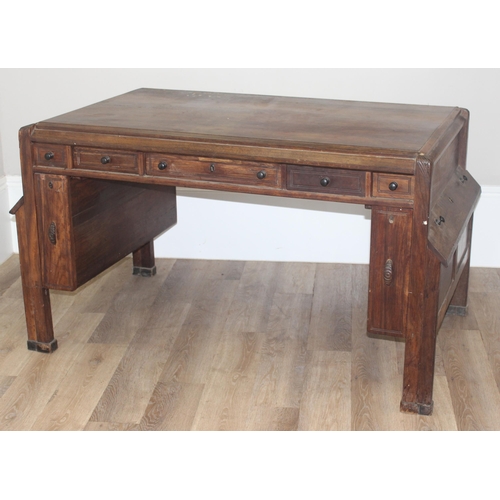 181 - A very unusual vintage hardwood desk believed to be made from reclaimed timbers with oak lined drawe... 