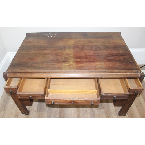 181 - A very unusual vintage hardwood desk believed to be made from reclaimed timbers with oak lined drawe... 