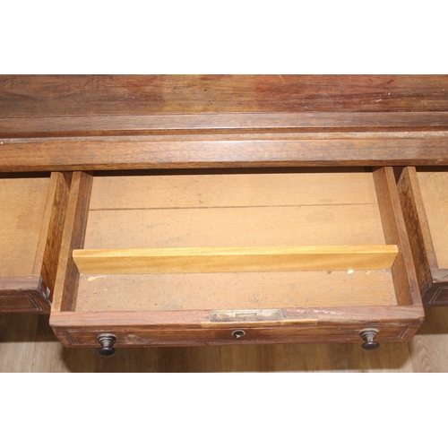 181 - A very unusual vintage hardwood desk believed to be made from reclaimed timbers with oak lined drawe... 