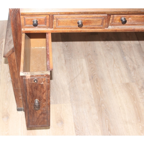 181 - A very unusual vintage hardwood desk believed to be made from reclaimed timbers with oak lined drawe... 