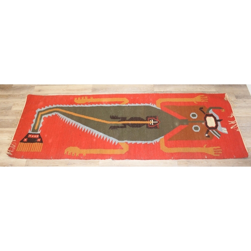 220 - A vintage flat weave rug with unusual colourful lizard decoration on orange ground, approx 300cm x 1... 