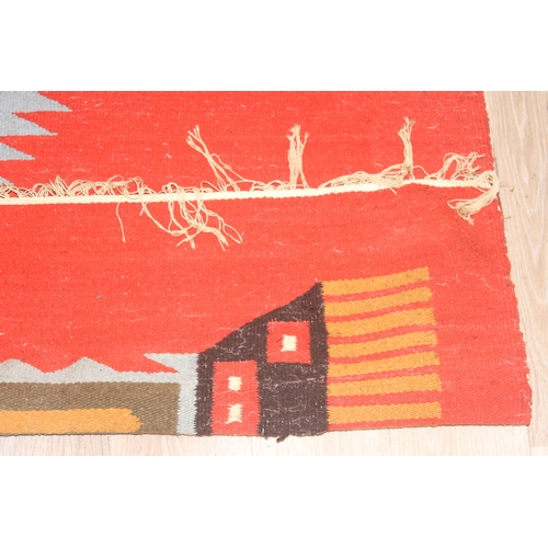 220 - A vintage flat weave rug with unusual colourful lizard decoration on orange ground, approx 300cm x 1... 