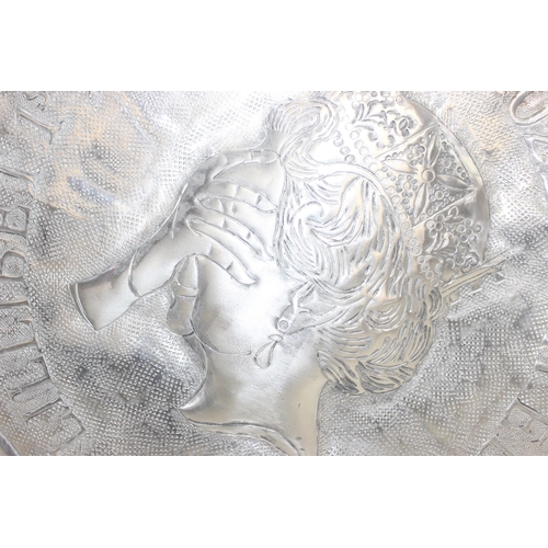 410 - Oversize novelty hammered wall décor 50 pence piece (50p) artwork dated 2022, approx 42cm wide