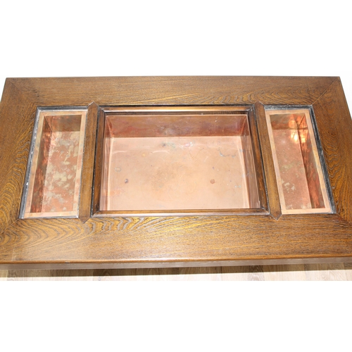 101 - A Japanese hardwood hibachi table with a central copper lined recess flanked by 2 smaller copper rec... 