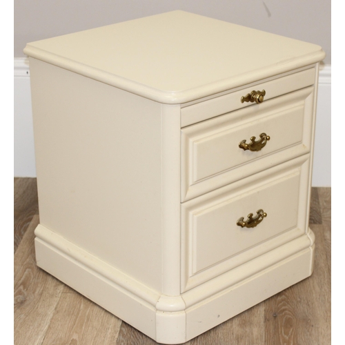 103 - A pair of white finished bedside cabinets by Olympus furniture, each with a slide and 2 drawers, eac... 