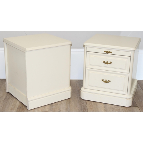 103 - A pair of white finished bedside cabinets by Olympus furniture, each with a slide and 2 drawers, eac... 