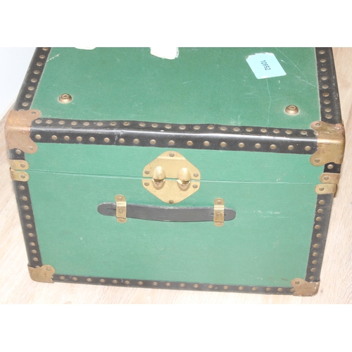 109 - 2 vintage shipping trunks, one with green covering the other with canvas and metal banding, the canv... 