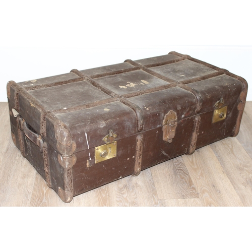 109 - 2 vintage shipping trunks, one with green covering the other with canvas and metal banding, the canv... 