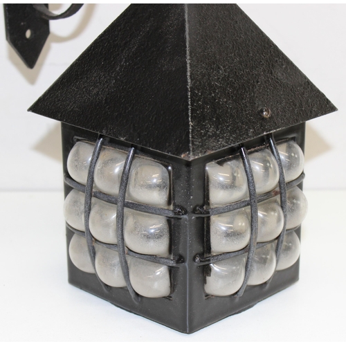 238 - 2 vintage Peter Marsh style outdoor lanterns with black painted metal bodies and glass panels