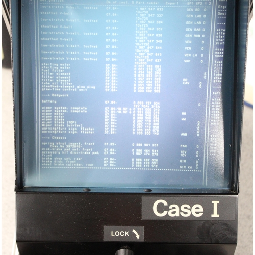 718 - A vintage portable Microphax Microfiche Case Series reader in case, with a number of Bosch car parts... 