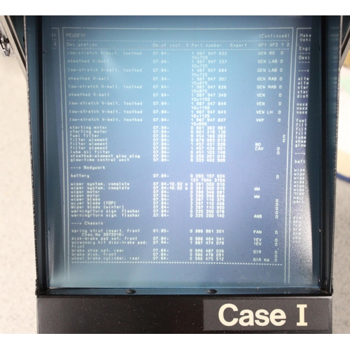 718 - A vintage portable Microphax Microfiche Case Series reader in case, with a number of Bosch car parts... 