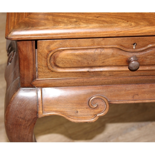 96 - A 20th century Oriental hardwood ladies' desk with 2 lower drawers and a stationary rack top, carved... 