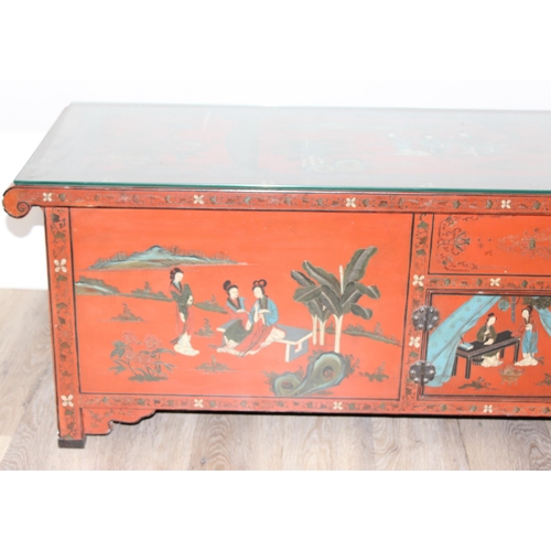 98 - A Chinese Red Lacquer Dwarf Cabinet, 20th century, the whole painted with figures and landscapes, ea... 