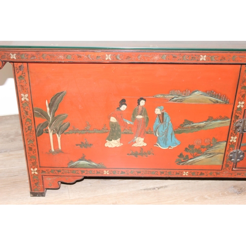 98 - A Chinese Red Lacquer Dwarf Cabinet, 20th century, the whole painted with figures and landscapes, ea... 