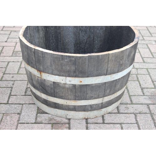 327 - Pair of vintage half sized wooden coopered barrel planters, approx 71cm W x 41cm H