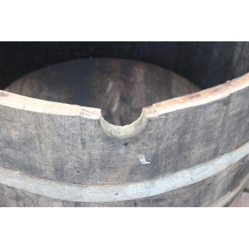 327 - Pair of vintage half sized wooden coopered barrel planters, approx 71cm W x 41cm H