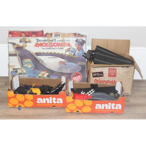 640 - A large qty of toy car racing accessories to include Scalextric, Matchbox Powertrack and Aurora