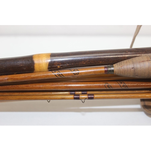 781 - 2 vintage fly fishing rods by H Rolls of Bedford, both with hollow bamboo brass ended tip holding se... 