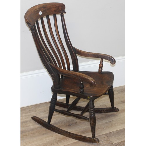 174 - Antique slat back Windsor rocking chair with elm seat, approx 102cm H