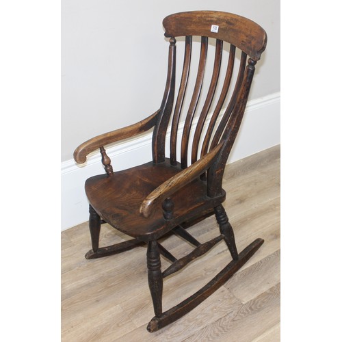 174 - Antique slat back Windsor rocking chair with elm seat, approx 102cm H