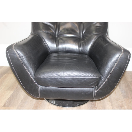 59 - Retro style black and chrome leatherette swivel armchair, approx 90cm x 86cm x 96cm