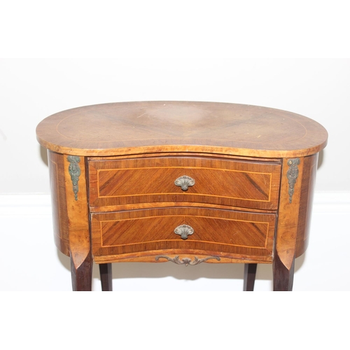 56 - A French kingwood kidney shaped side table with 2 drawers and gilt metal mounts, likely early 20th c... 