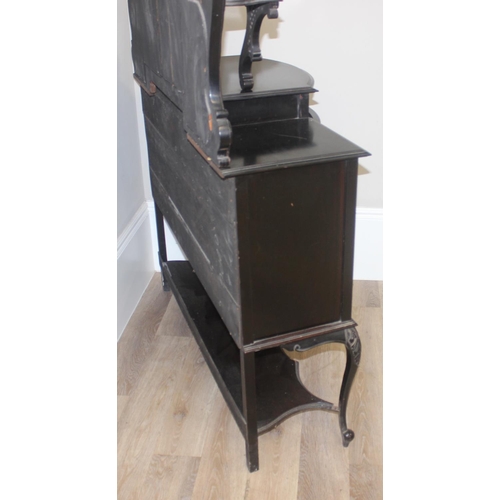 22 - A Victorian ebonised chiffonier or sideboard with mirror and shelf top with domed glass display cabi... 