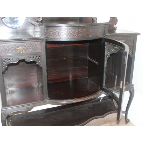 22 - A Victorian ebonised chiffonier or sideboard with mirror and shelf top with domed glass display cabi... 