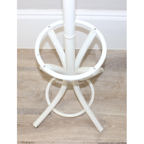 27 - A white painted freestanding coat and hat stand, approx 185cm tall