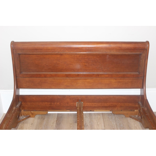 24 - A good quality modern Cherrywood finished sleigh bed frame, seemingly to fit a UK king size mattress... 