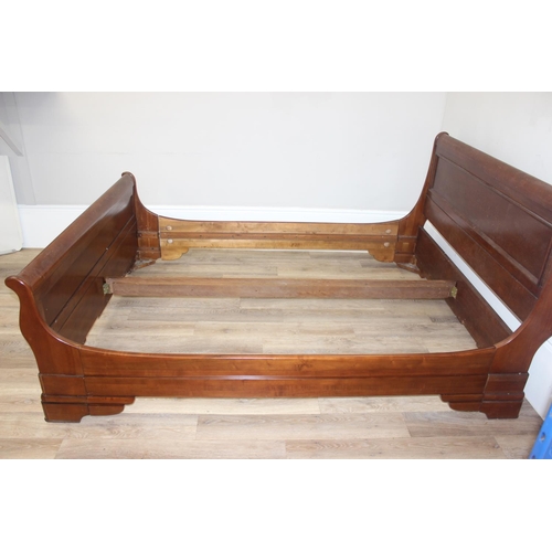 24 - A good quality modern Cherrywood finished sleigh bed frame, seemingly to fit a UK king size mattress... 