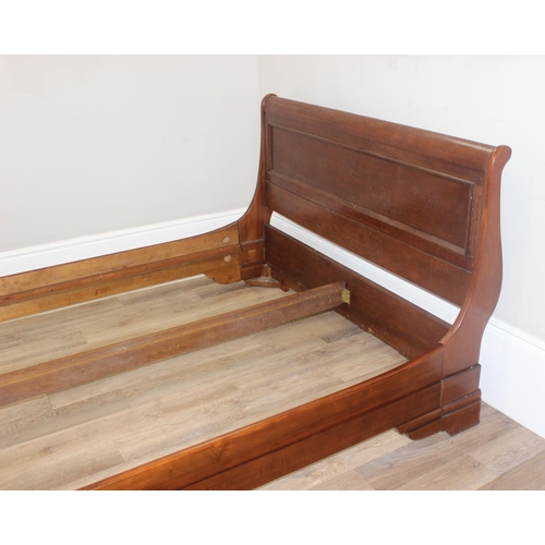 24 - A good quality modern Cherrywood finished sleigh bed frame, seemingly to fit a UK king size mattress... 