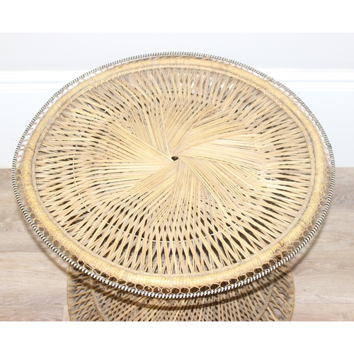 41 - A vintage retro wicker table of twisted form, similar to the base of a peacock chair, approx 61cm in... 