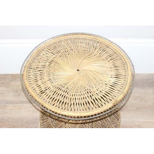 41 - A vintage retro wicker table of twisted form, similar to the base of a peacock chair, approx 61cm in... 