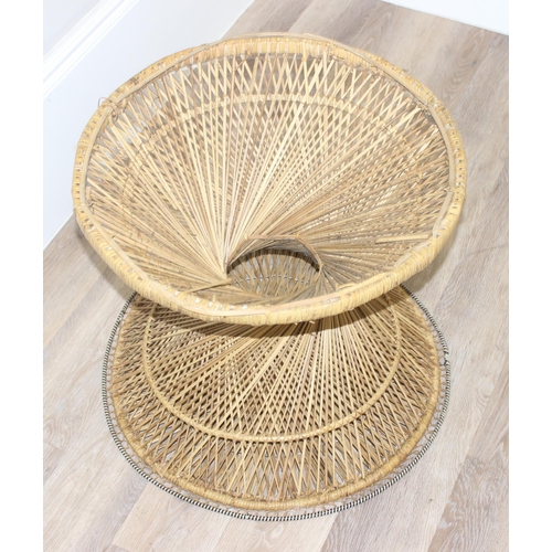 41 - A vintage retro wicker table of twisted form, similar to the base of a peacock chair, approx 61cm in... 