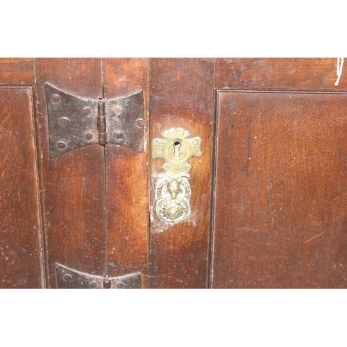 23 - An antique country oak dresser, likely 18th century, the base comprising of 3 cupboards under 3 draw... 