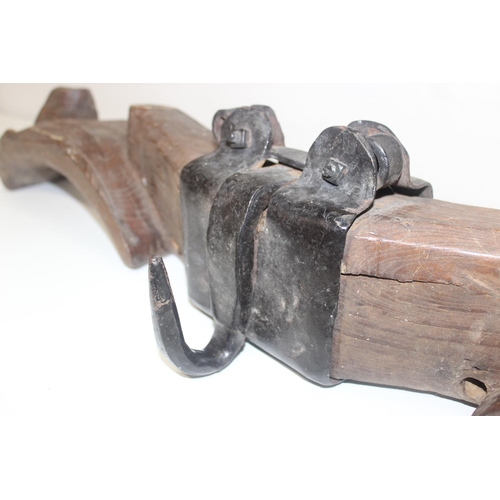 53 - A rustic elm and wrought iron oxen yoke, approx 120cm wide