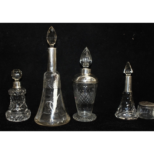 1021 - 8 assorted silver mounted and cut glass jars and bottles, 7 with English hallmarks and all XRF confi... 