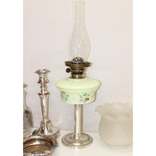 1025 - Qty of vintage and later cut glass, silver plate items, and an oil lamp with decorative glass reserv... 