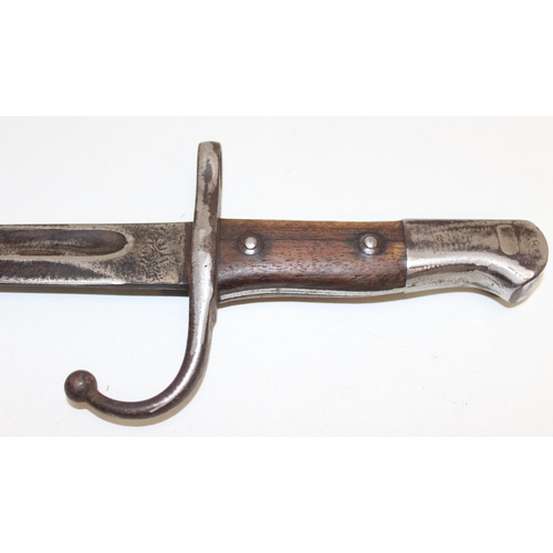 1408 - An early 20th century Mauser bayonet with Arabic marks, probably Turkish, approx 58cm long