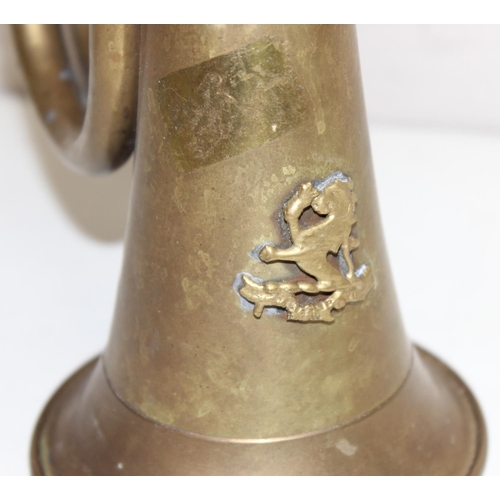 1412 - A military style brass bugle with silver plated mouth piece marked for Potter of Aldershot, with app... 