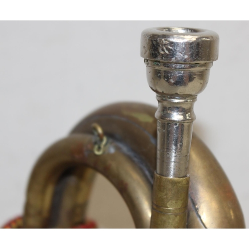 1412 - A military style brass bugle with silver plated mouth piece marked for Potter of Aldershot, with app... 