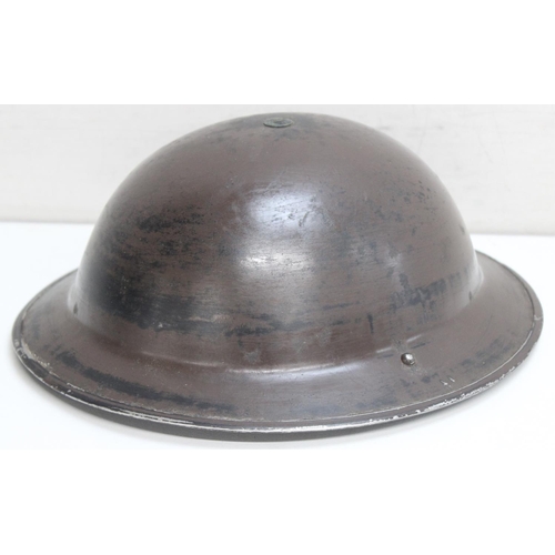 1415 - A WW2 period British military Brodie helmet